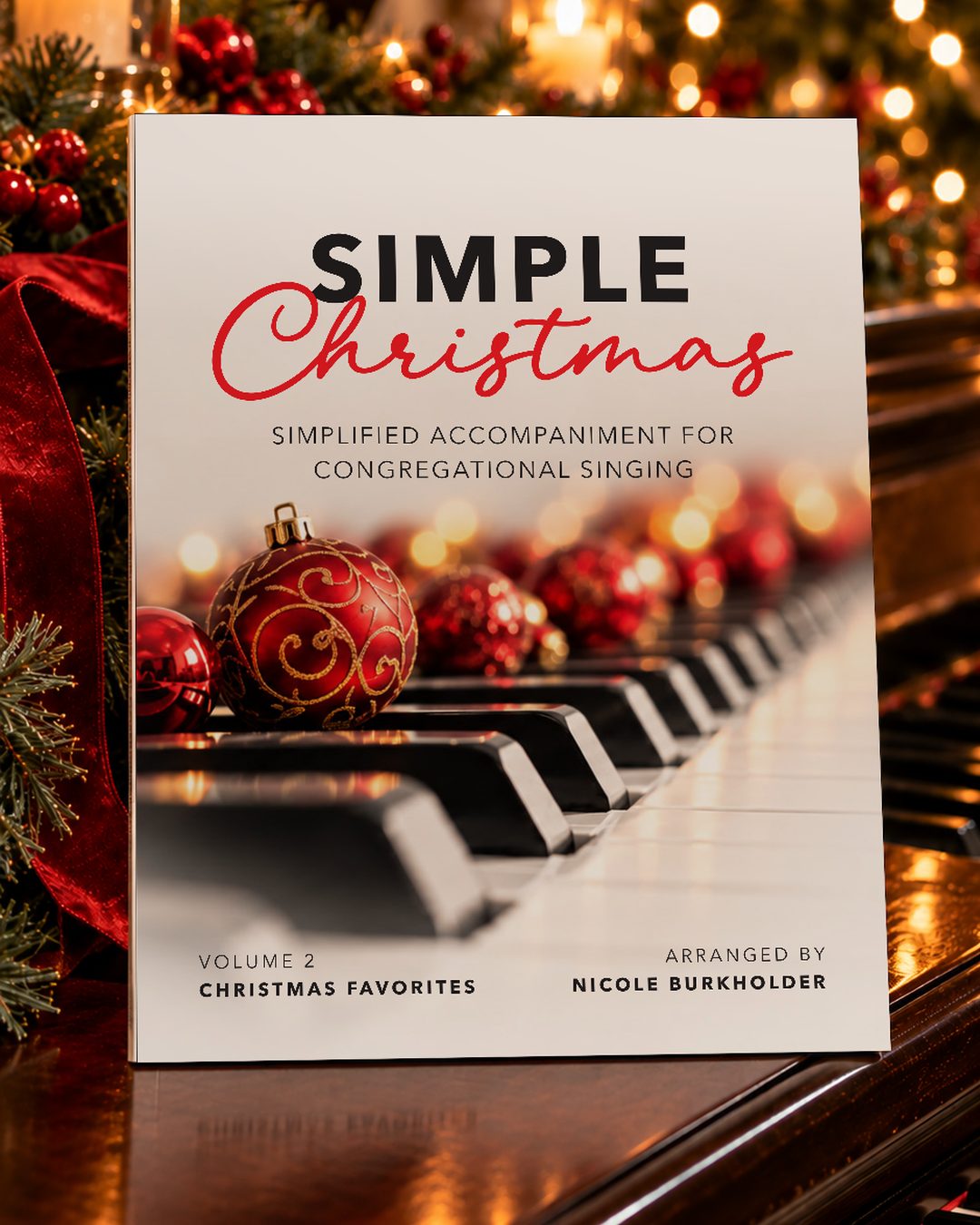 Simple Christmas perfect-bound book standing on a piano with Christmas lights